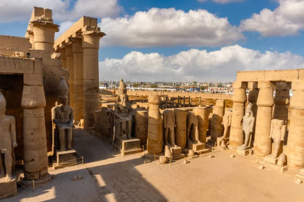 Luxor Temple Tour illuminated at night, east bank of the Nile, Egypt