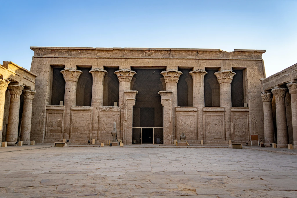 Edfu Temple hypostyle hall columns and inner courtyard with Horus statue