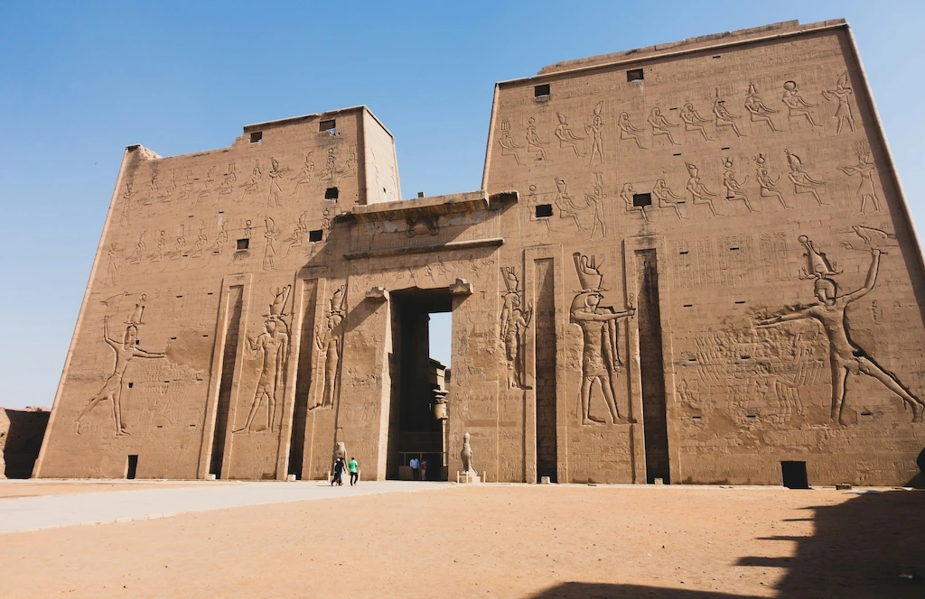 Temple of Edfu Egypt pylon entrance with ancient hieroglyphic carvings