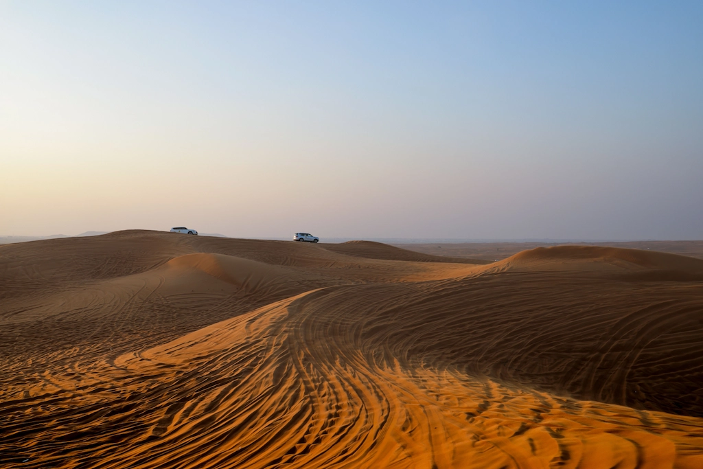Golden sand dunes of the Eastern Desert near Hurghada excursion during a 4x4 desert safari at sunset