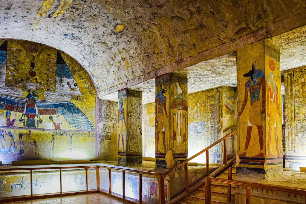 Colorfully painted interior of a royal tomb in the Valley of the Kings, Luxor — a vivid example of New Kingdom Egyptian funerary art - king tut tour curse