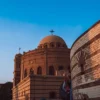 Coptic Cairo Egypt hanging church dome and cross against blue sky