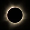 Total solar eclipse corona glowing around the darkened sun, the sight travelers seek on an Egypt Solar Eclipse Tour- Egypt Solar Eclipse Tour