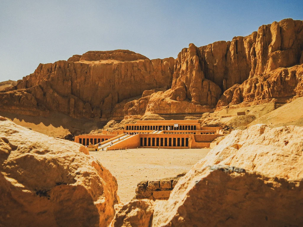 Upper Egypt Travel Guide - Hatshepsut Temple set against the desert cliffs on Luxor's West Bank