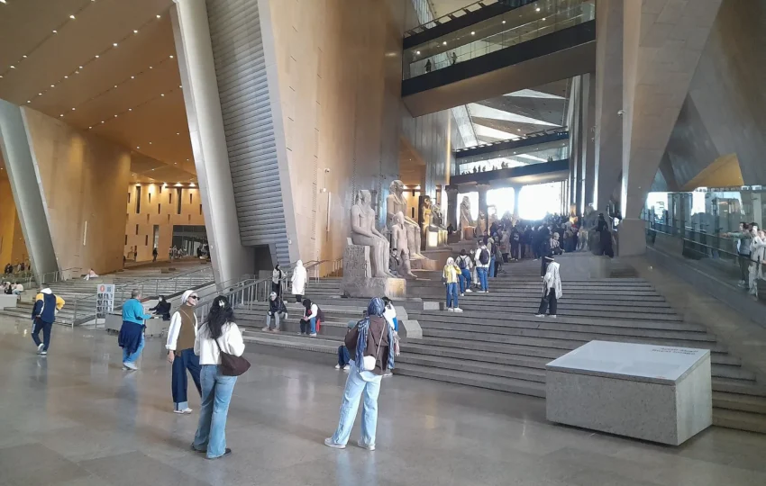 Visitors on the grand staircase inside the Grand Egyptian Museum on day one