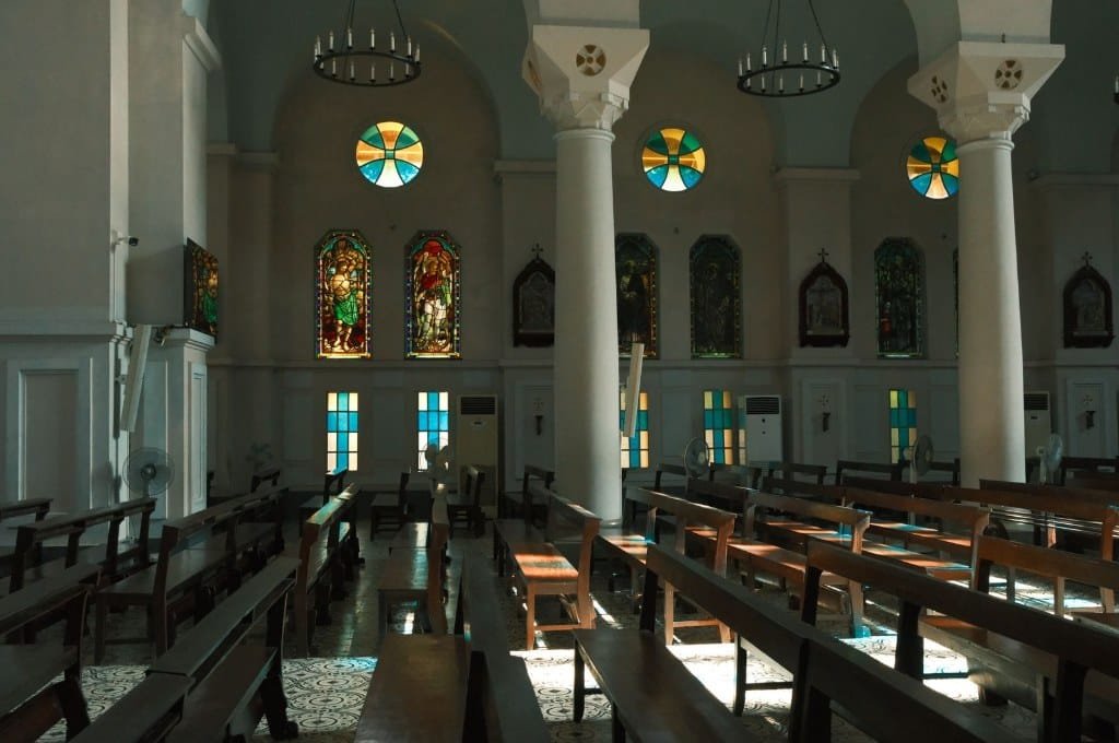 Coptic church interior with wooden pews near the Hanging Church Egypt