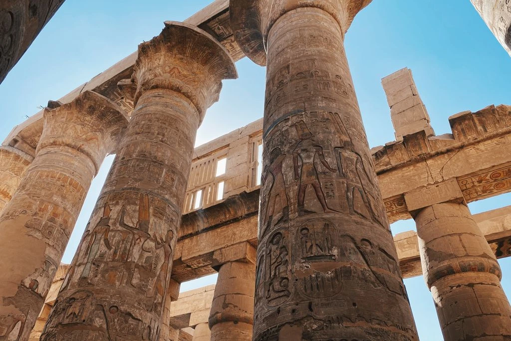 Ancient Egypt Pharaohs - Hieroglyph-covered columns at Karnak Temple showing pharaoh cartouches