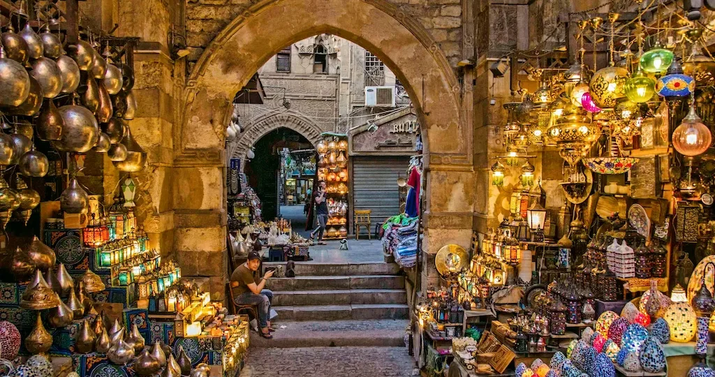 Lantern-lit alley in Khan El Khalili What to buy in souk, Cairo