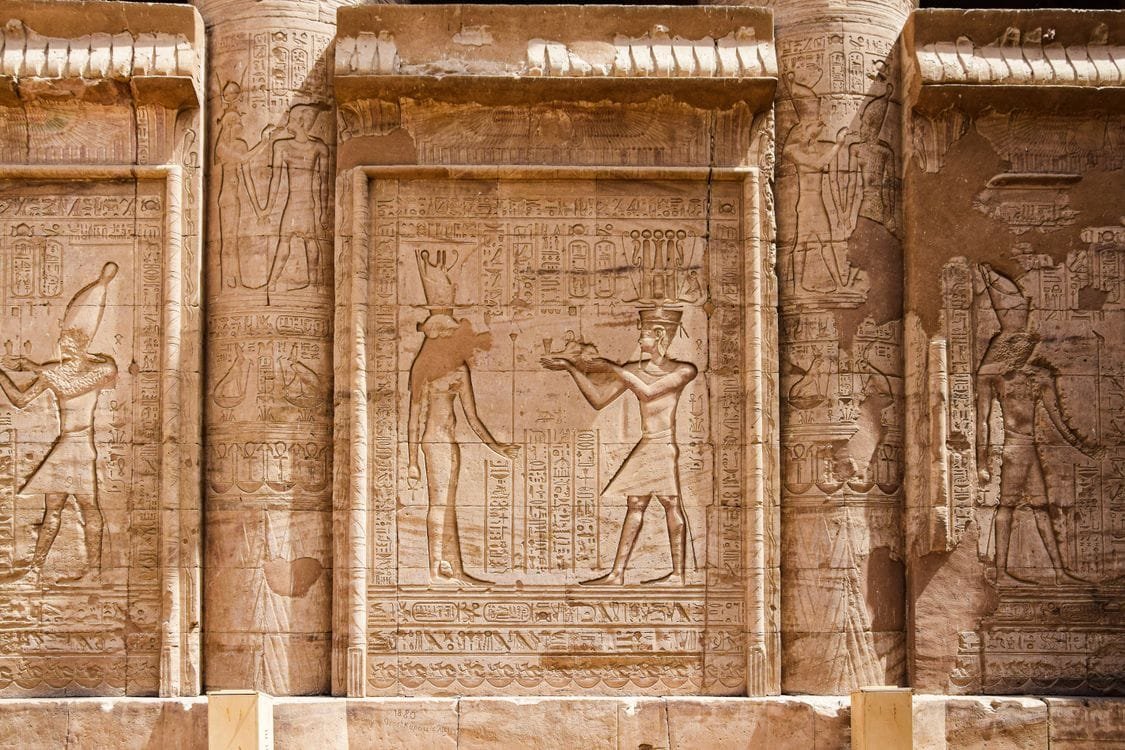 Temple relief carving reflecting queen of Egypt Nefertari's royal status