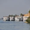 Best Christmas vacations: Nile cruise ships moored along the river in Egypt