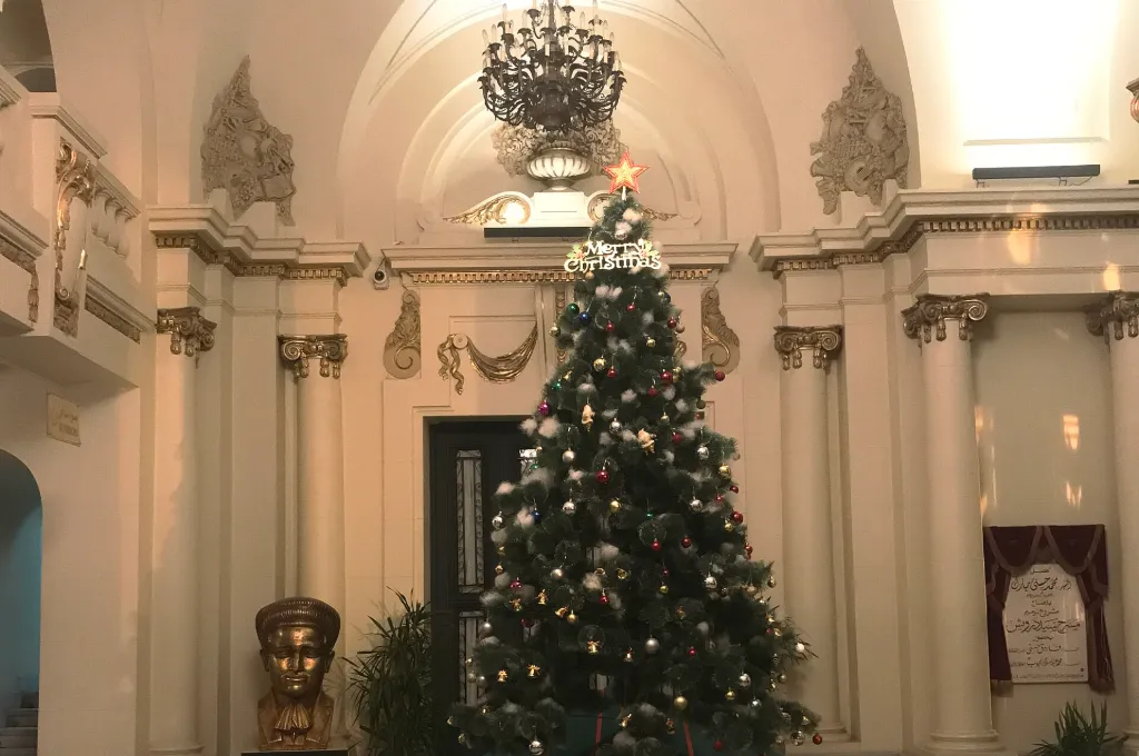 Christmas in Egypt: a decorated Christmas tree glowing in the lobby of the Alexandria Opera House