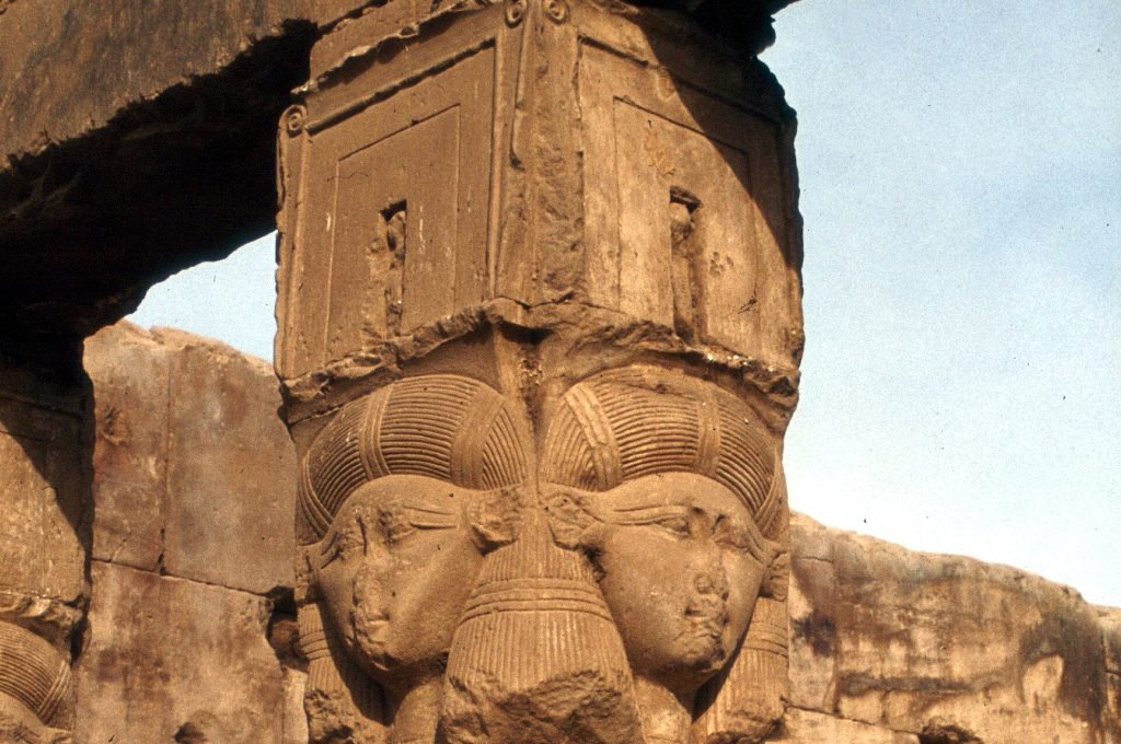 Hathor-headed column capital inside Dendera temple in Egypt