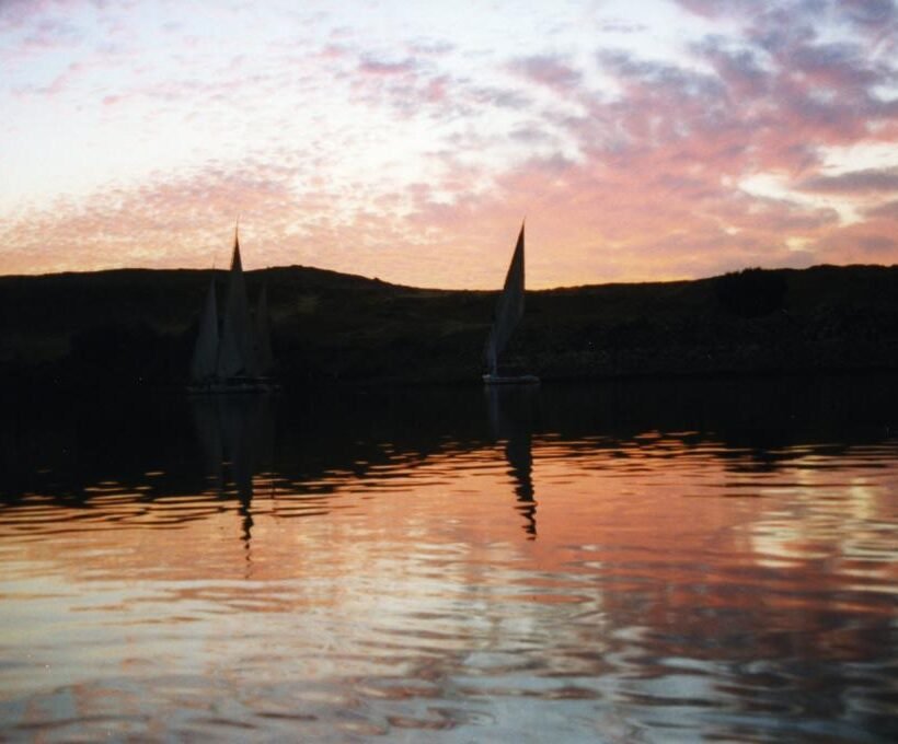 Felucca sails on the Nile at sunset, a classic felucca ride in Aswan