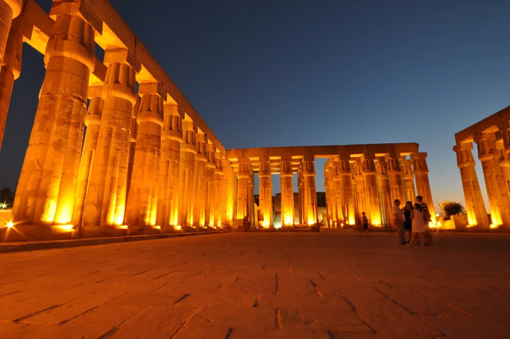 Illuminated Luxor Temple at night during winter in Egypt