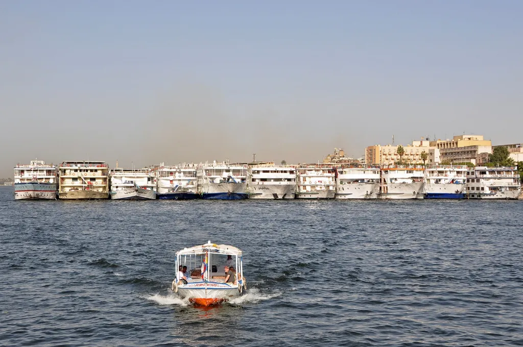 Nile cruise ships moored on the river for a new year in Egypt