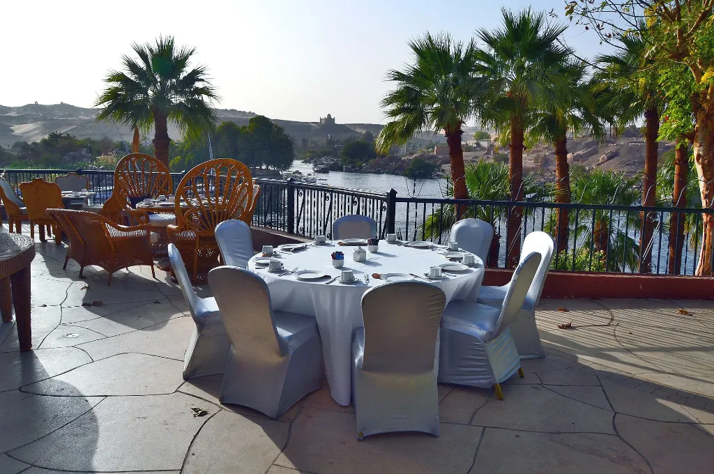 Old Cataract Hotel terrace above the Nile in Aswan, a calm 1 January morning during Christmas and New Year in Egypt